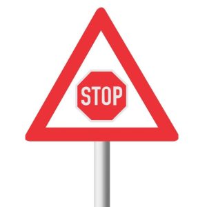 Traffic Control _Stop_ Ahead road sign (W302