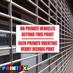 No Private Vehicles Beyond Point Business Sign
