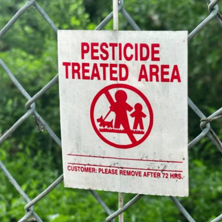 poison and pesticides business signs